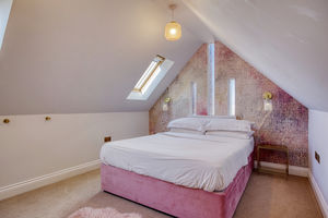Bedroom One- click for photo gallery